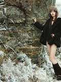 Beautiful girl shows her body in ice and snow(9)