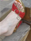 Fanny enjoys leisure time. Red sandal(30)