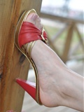 Fanny enjoys leisure time. Red sandal(34)