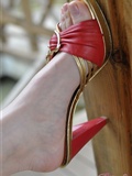 Fanny enjoys leisure time. Red sandal(36)